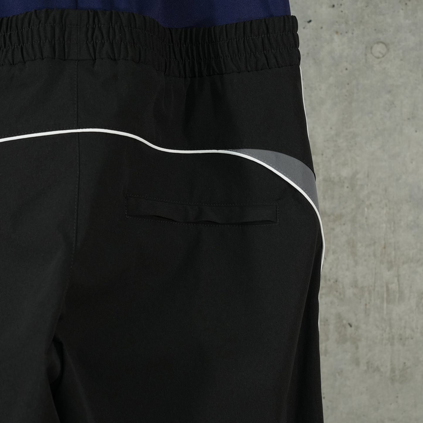 CUT-UP TRACKSUIT PANTS / 1000:BLACK