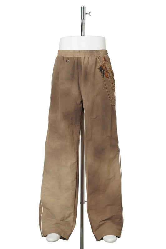 TROMPE L'OEIL EMBROIDERY TRACK PANTS / BEIGE