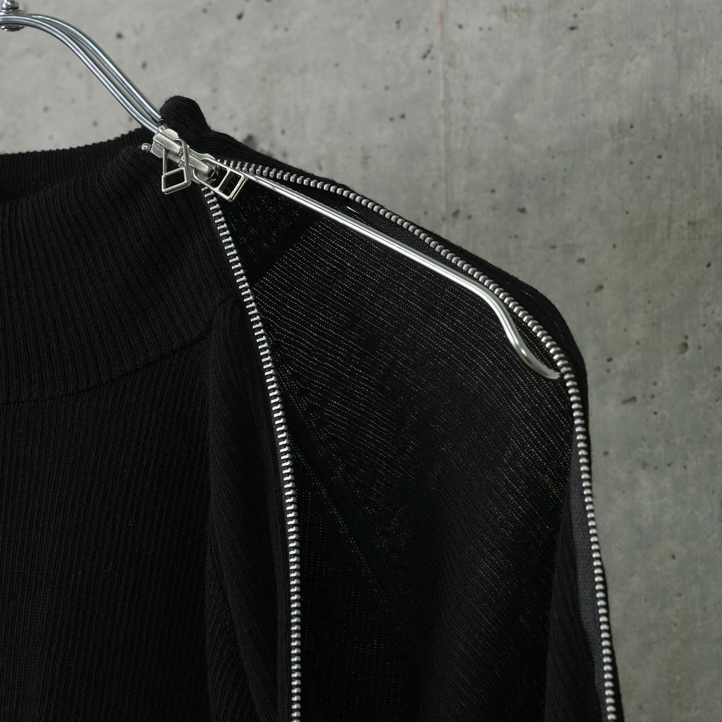 ZIPPED SLEEVE MOCK NECK SWEATER / BLACK