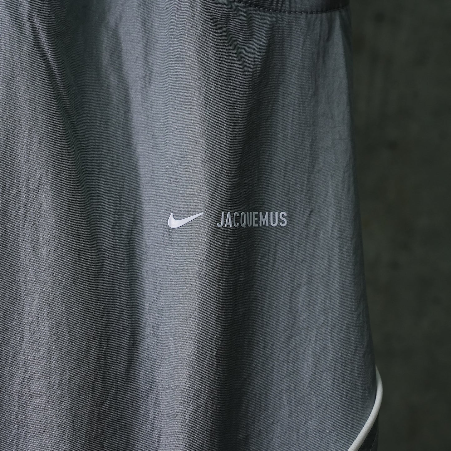 AS U NRG JACQUEMUS TRACK PANT / 073:PARTICLE GREY/WHITE