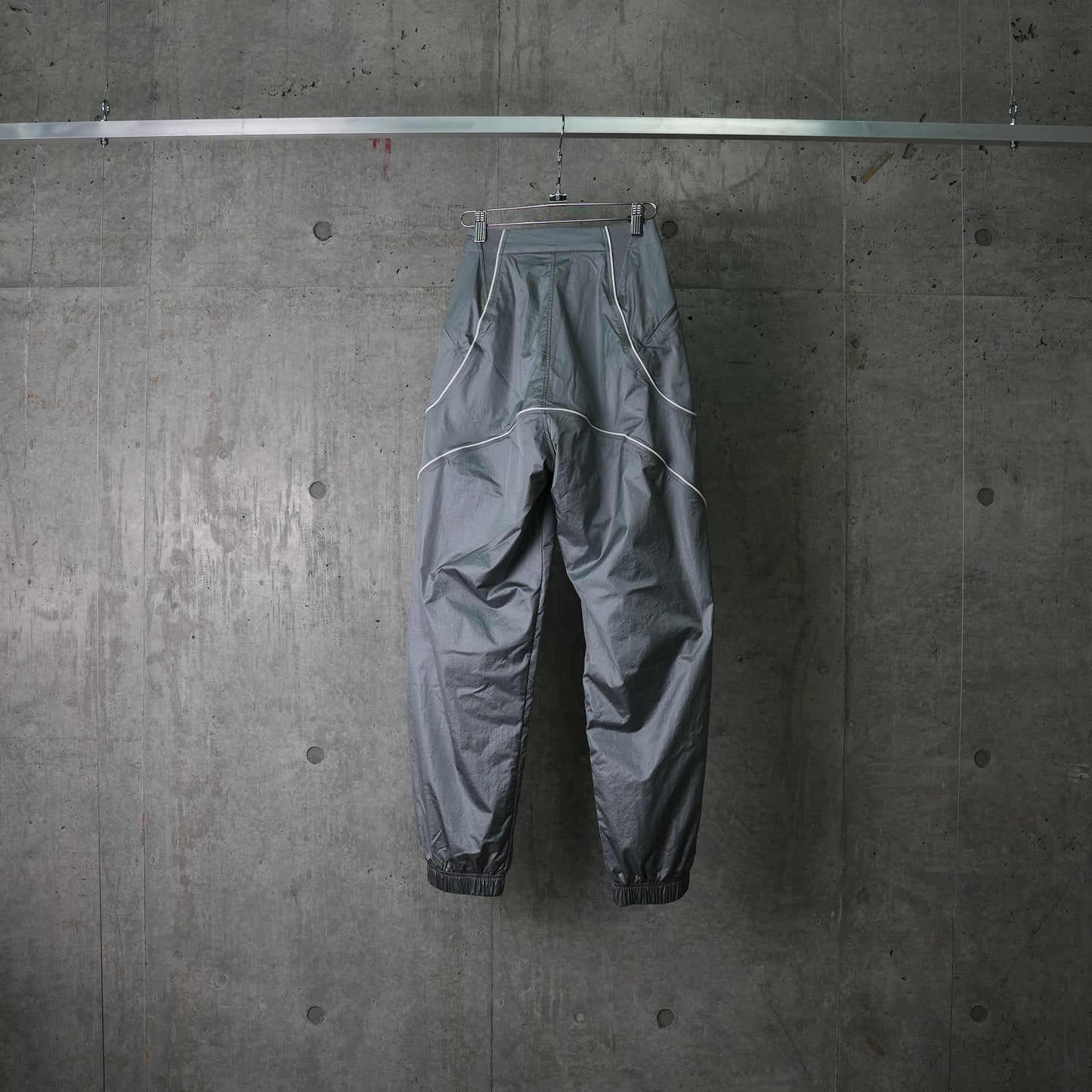 AS U NRG JACQUEMUS TRACK PANT / 073:PARTICLE GREY/WHITE