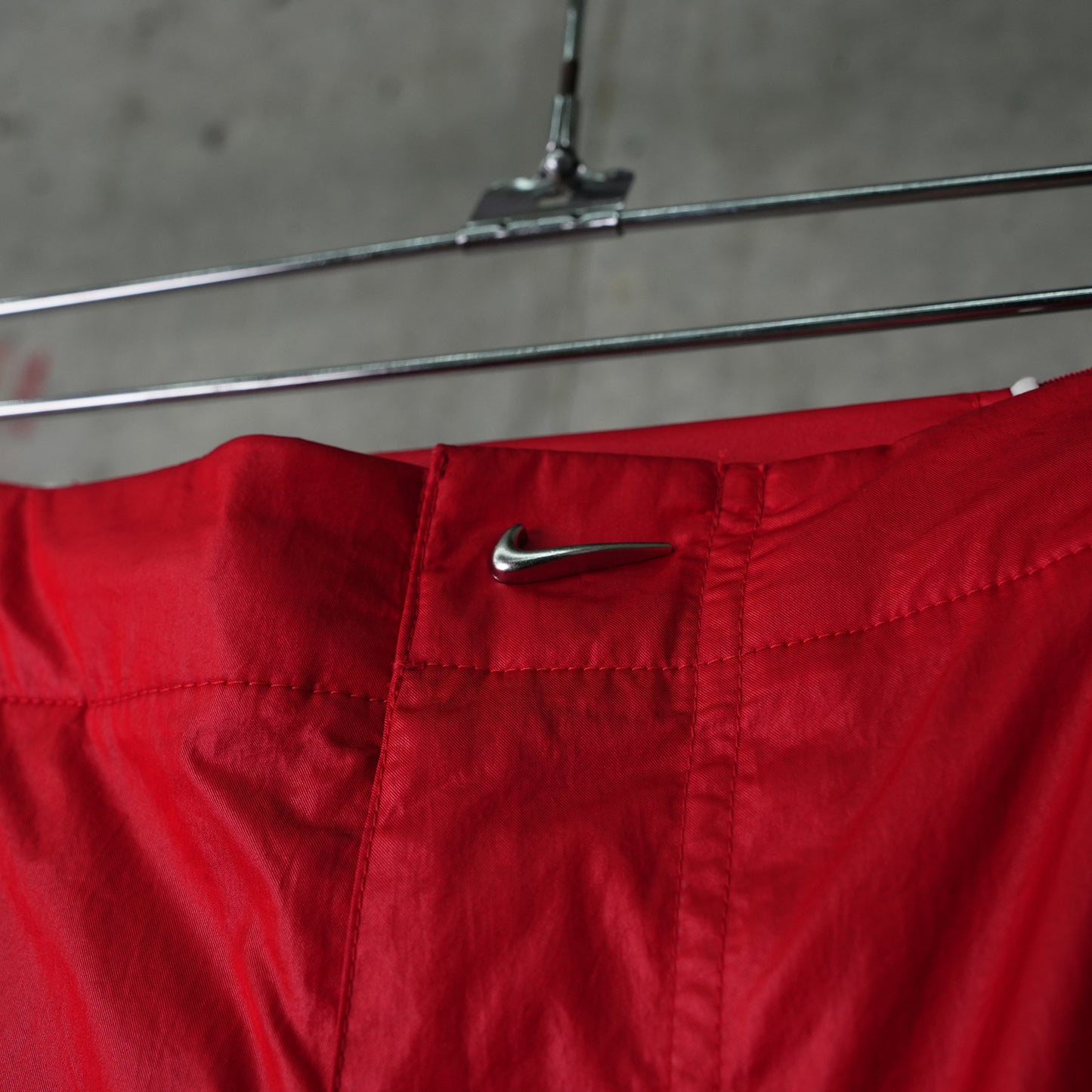 AS U NRG JACQUEMUS TRACK PANT / 642:MYSTIC RED/WHITE