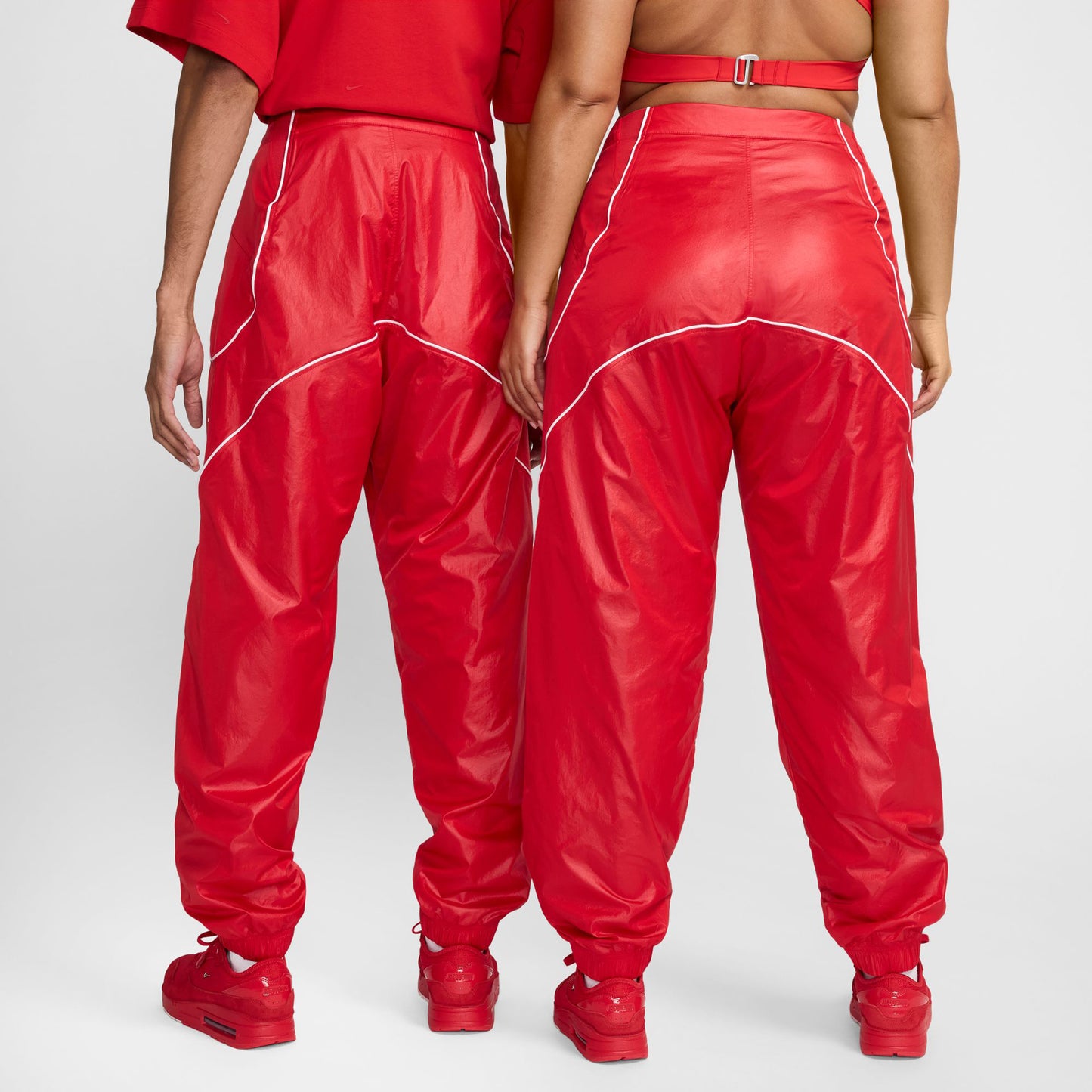 AS U NRG JACQUEMUS TRACK PANT / 642:MYSTIC RED/WHITE