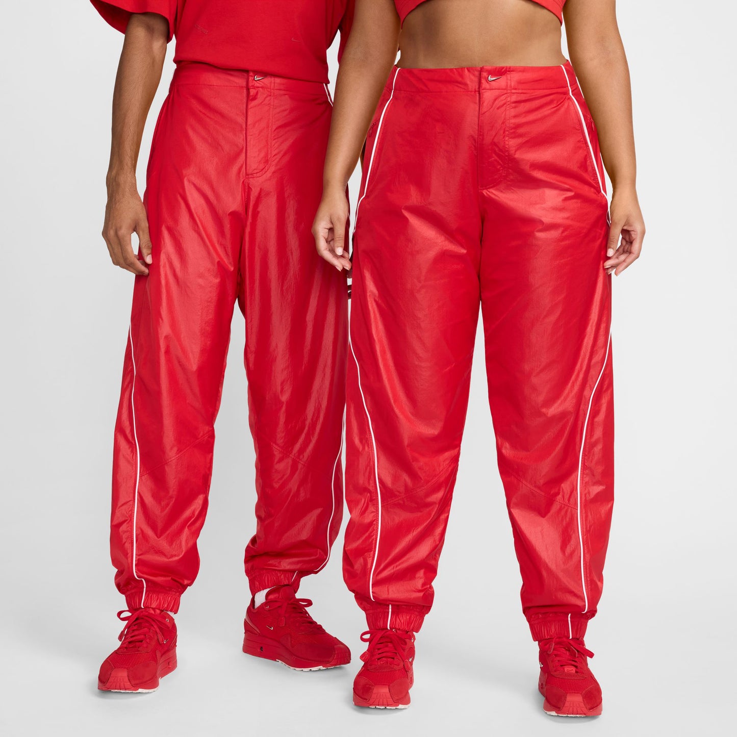 AS U NRG JACQUEMUS TRACK PANT / 642:MYSTIC RED/WHITE