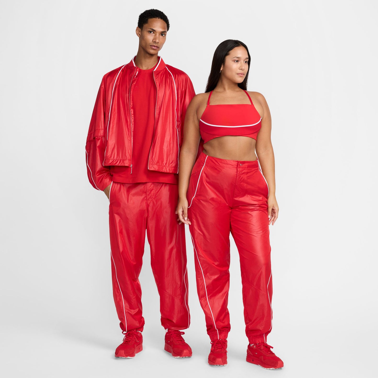 AS U NRG JACQUEMUS TRACK PANT / 642:MYSTIC RED/WHITE