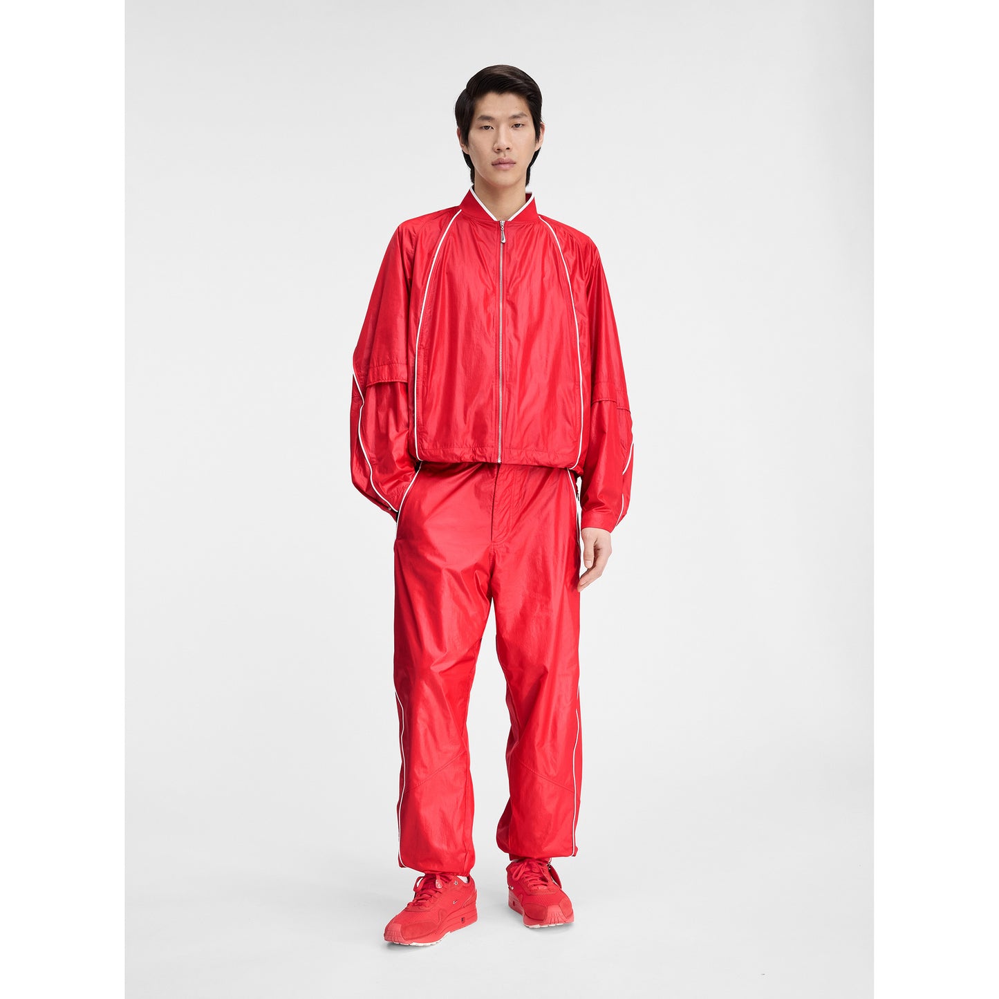 AS U NRG JACQUEMUS TRACK PANT / 642:MYSTIC RED/WHITE