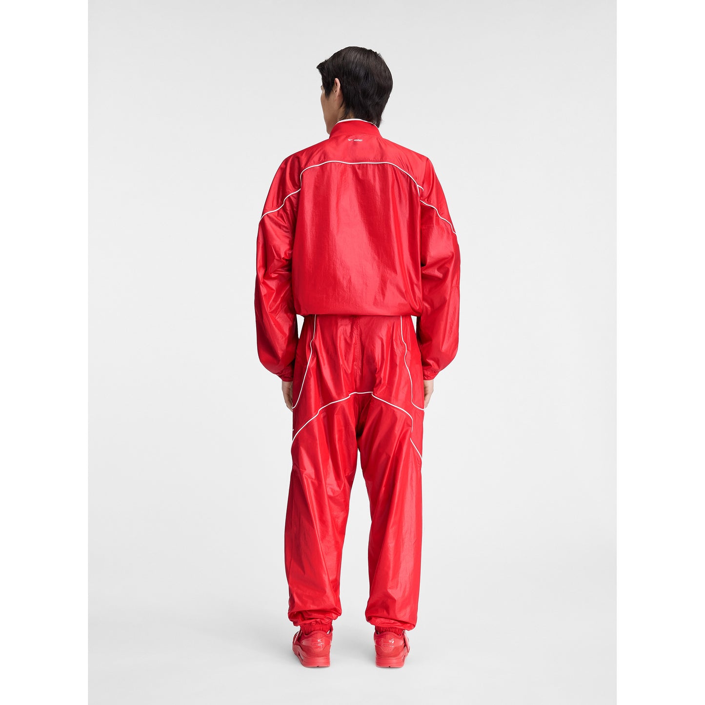 AS U NRG JACQUEMUS TRACK PANT / 642:MYSTIC RED/WHITE