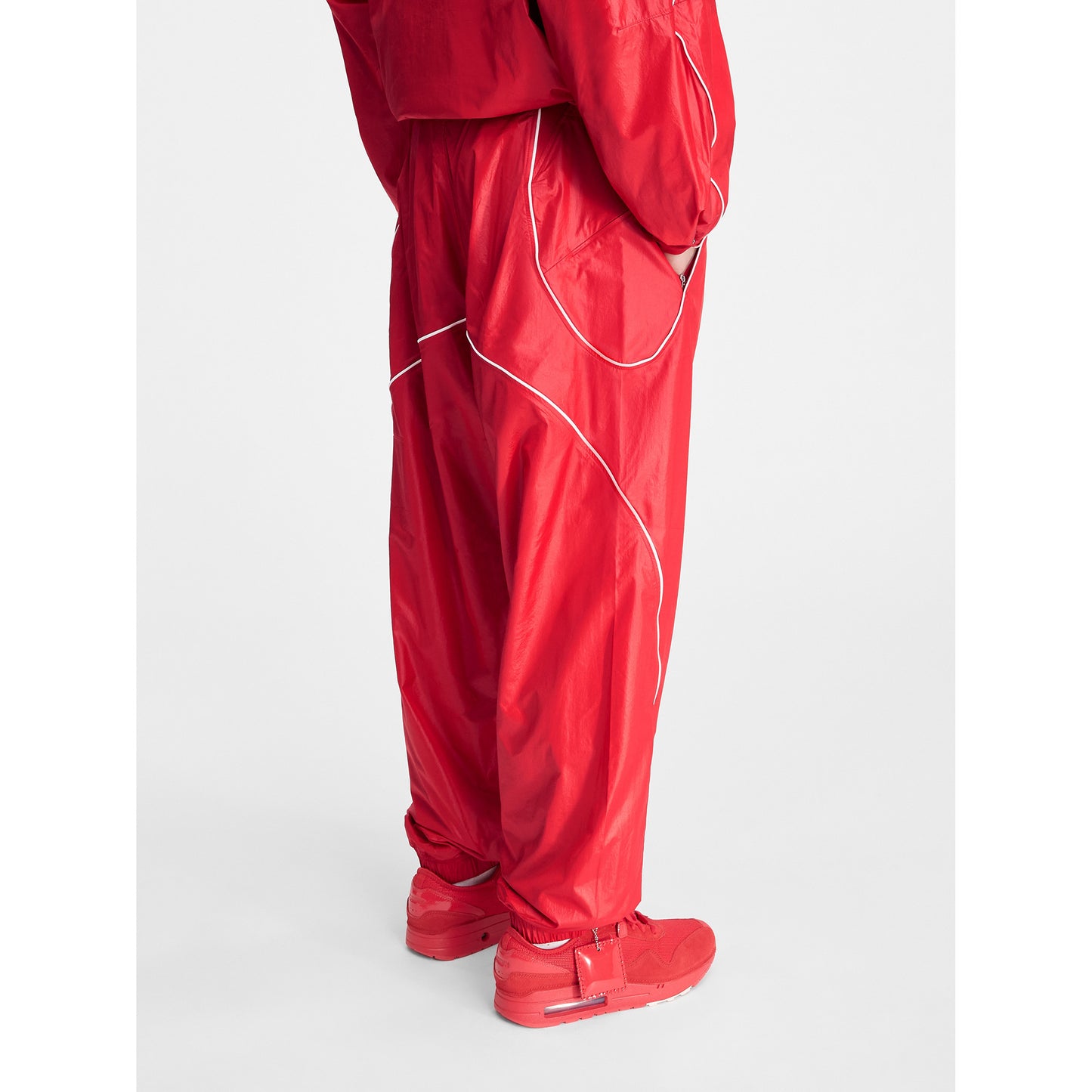 AS U NRG JACQUEMUS TRACK PANT / 642:MYSTIC RED/WHITE