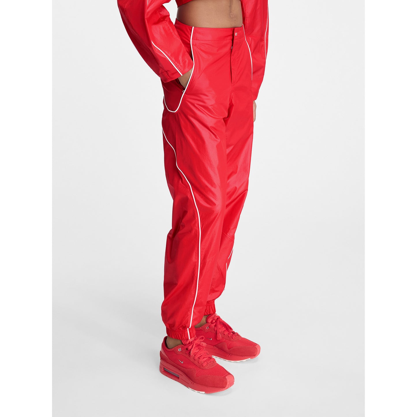 AS U NRG JACQUEMUS TRACK PANT / 642:MYSTIC RED/WHITE