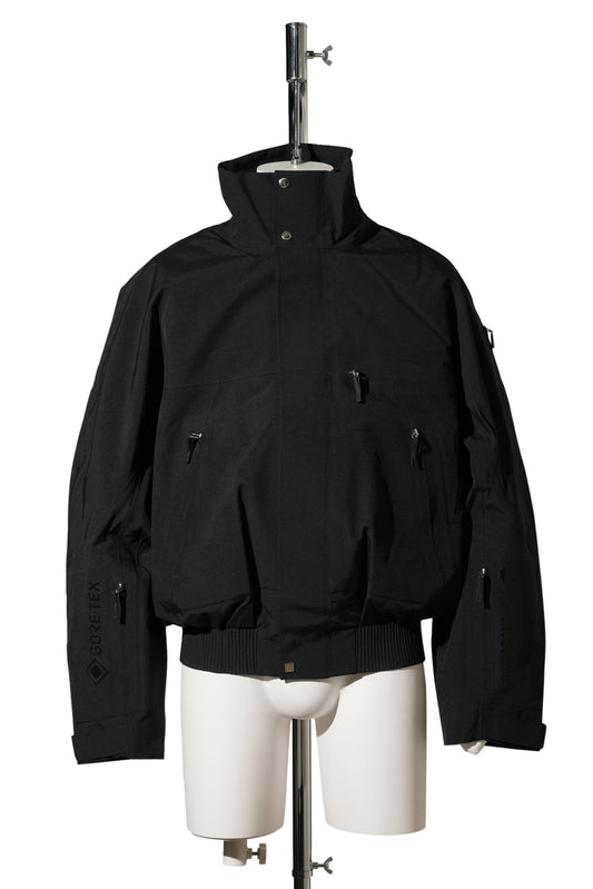 U NRG JACQUEMUS GTX 2N1 JKT / 010:BLACK/LT OREWOOD BRN
