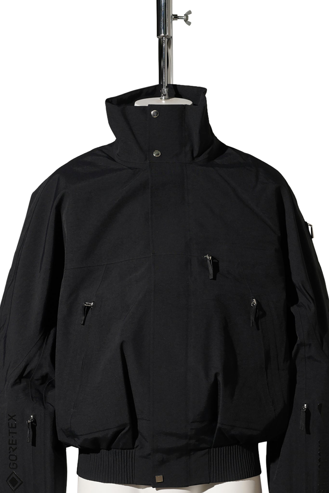 U NRG JACQUEMUS GTX 2N1 JKT / 010:BLACK/LT OREWOOD BRN