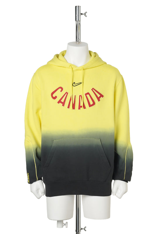Canada x NOCTA NIKE CAX NRG NOCTA CS L/S HOODIE / 704:SONIC YELLOW/BLACK/GYM RED