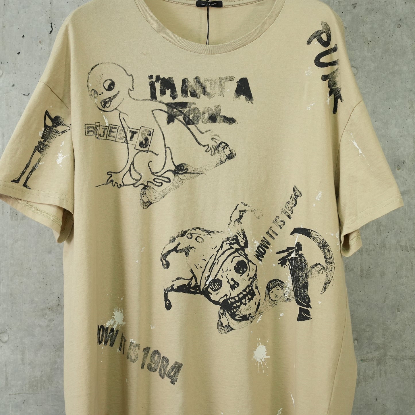 STAMP RELAXED T / 001UU:KHAKI WITH PAINT SPLATTER