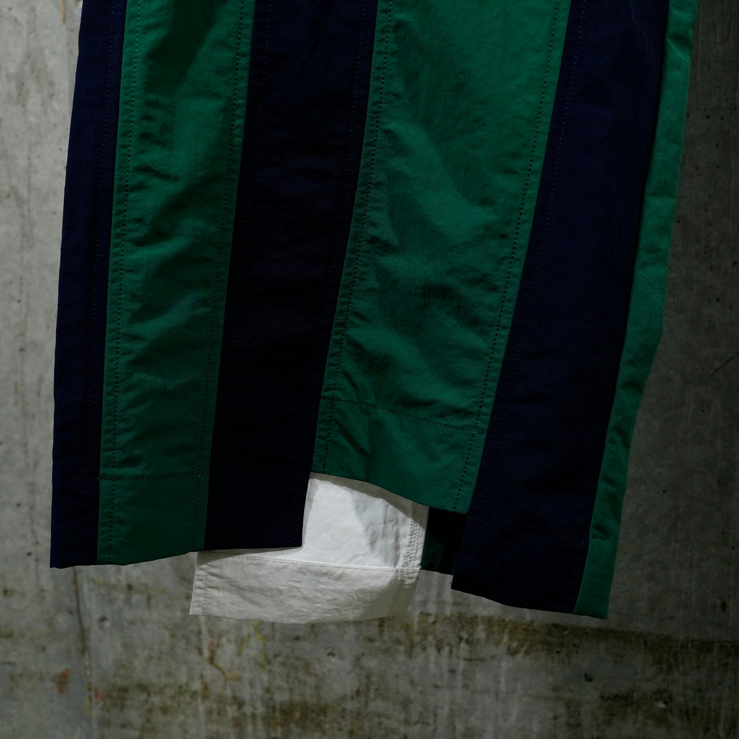 PANELED TRACK PANTS / NAVY/FOREST GREEN