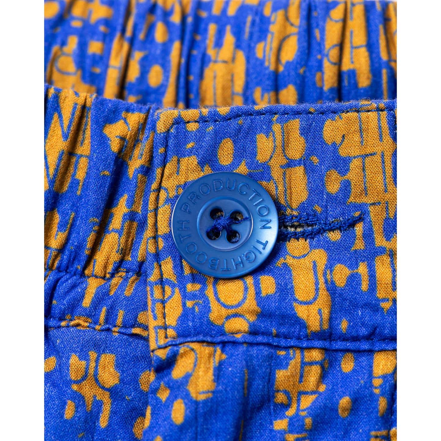 BLEEDING LOGO BALLOON PANTS / BLUE x MUSTARD
