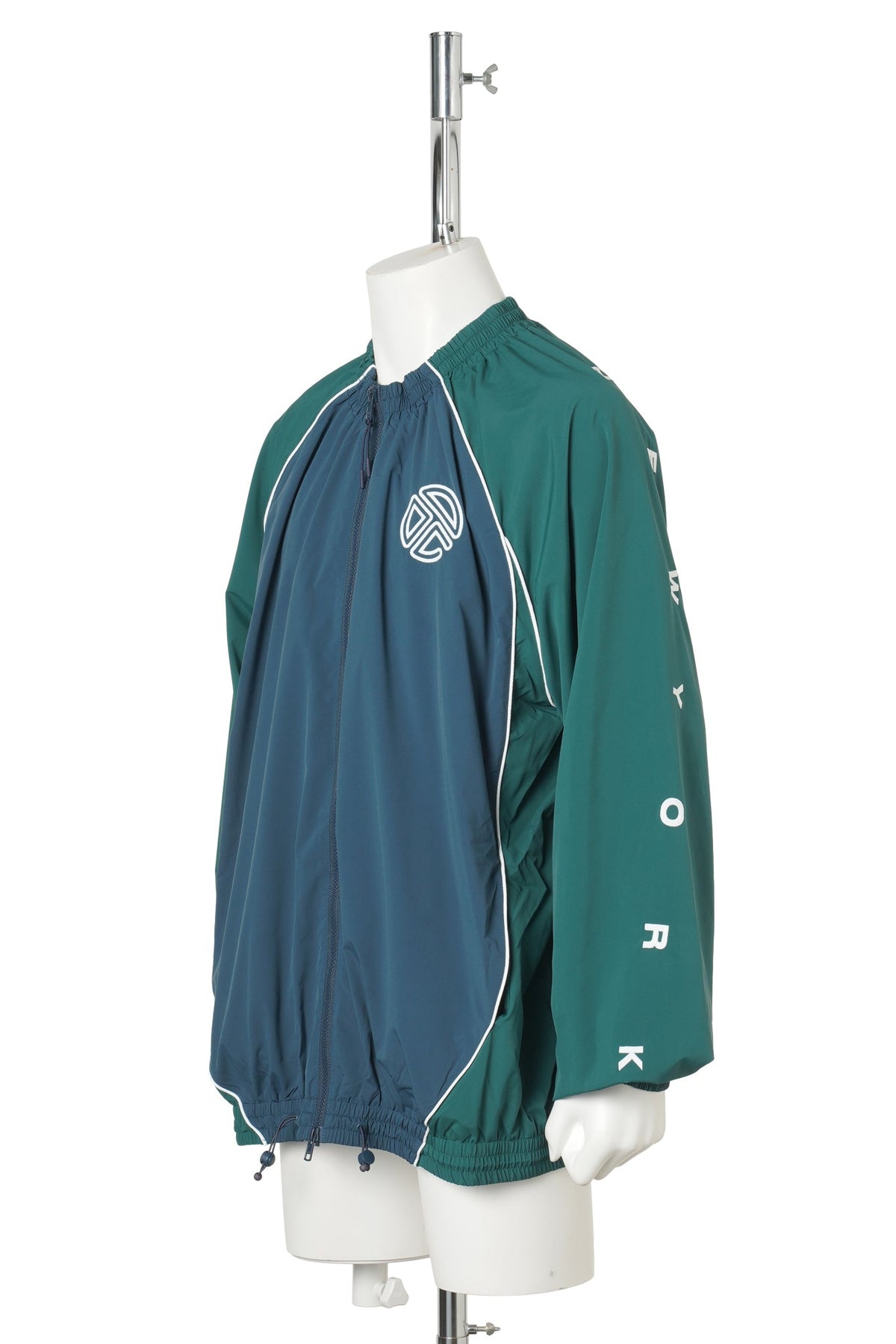 UPSIDE DOWN WINDBREAKER JACKET / GREEN/BLUE